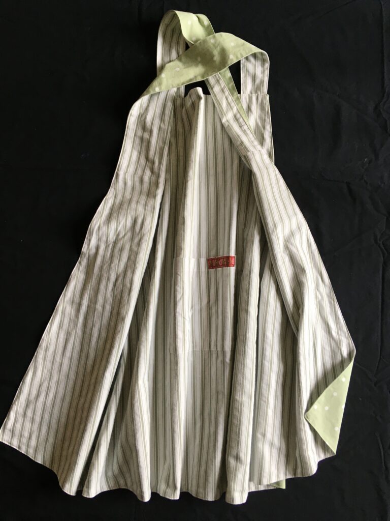 184 Sage dotty pinny's stripey reverse view
