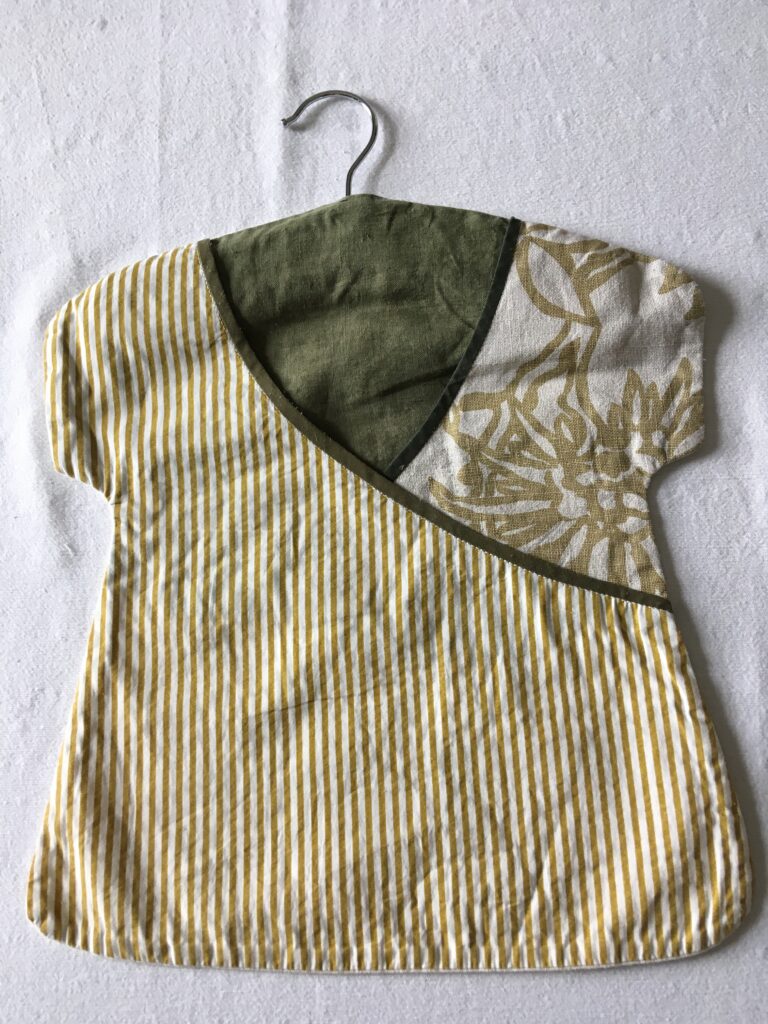 Trad style peg bag: imitating small cross-over style dress on hanger